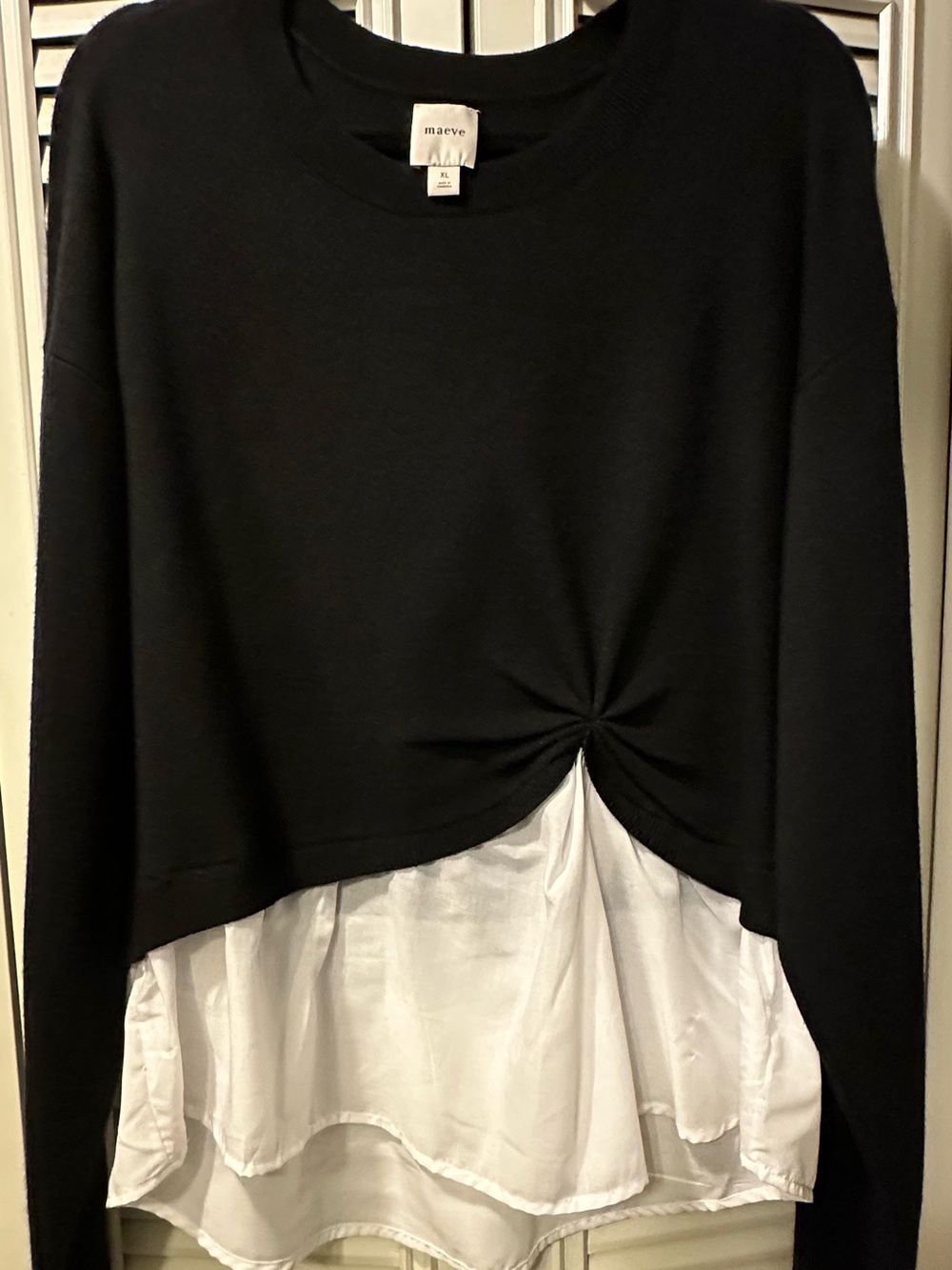Maeve Black Crewneck Knit Sweater with white shirt tails.